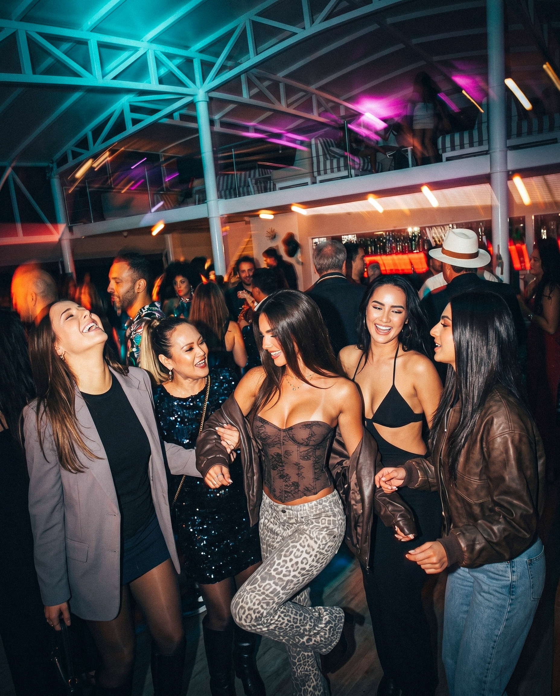 Guests enjoying R&B Fridays aboard YOT ONE