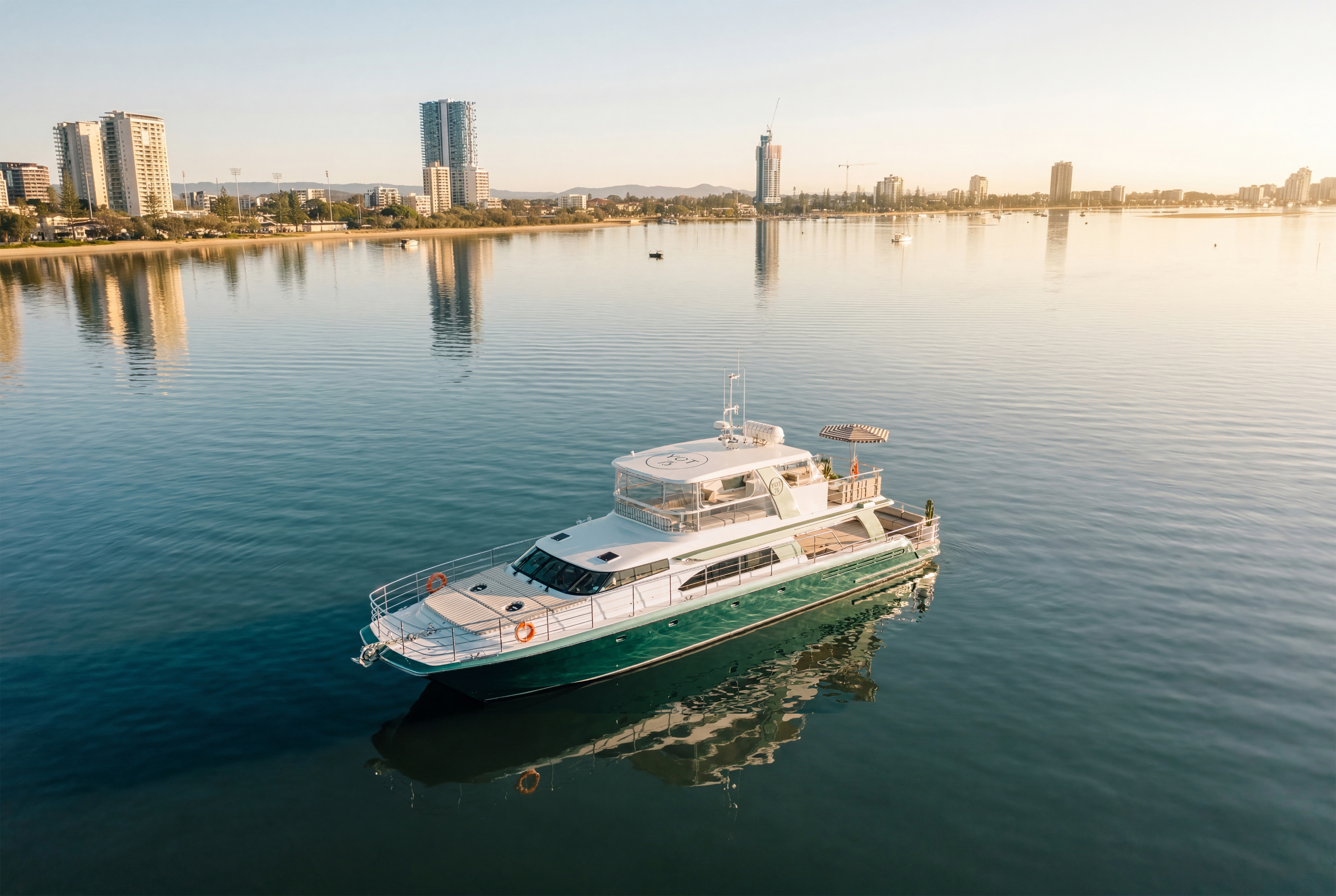 YOT 75 cruising past the Gold Coast skyline